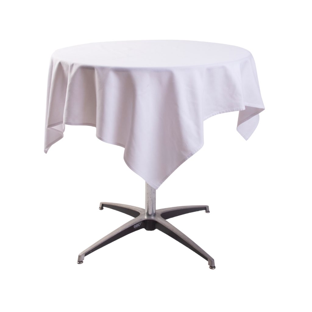 Cafe table with white tablecloth