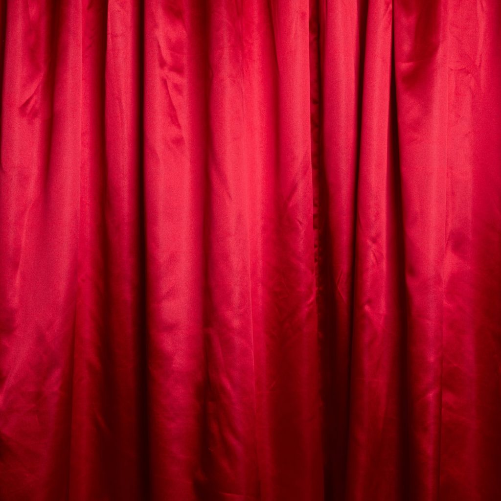Red shinny drape