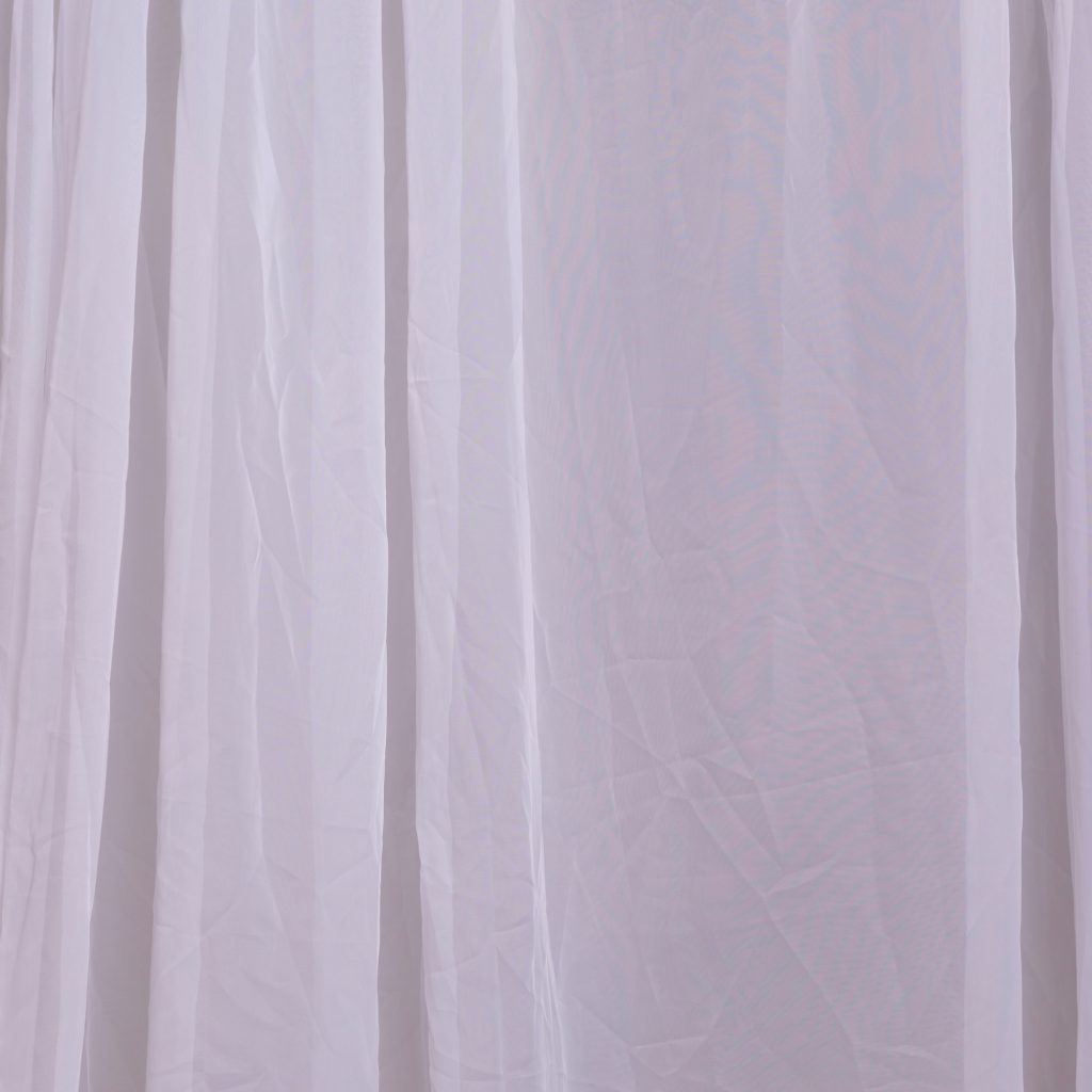 White voile drape